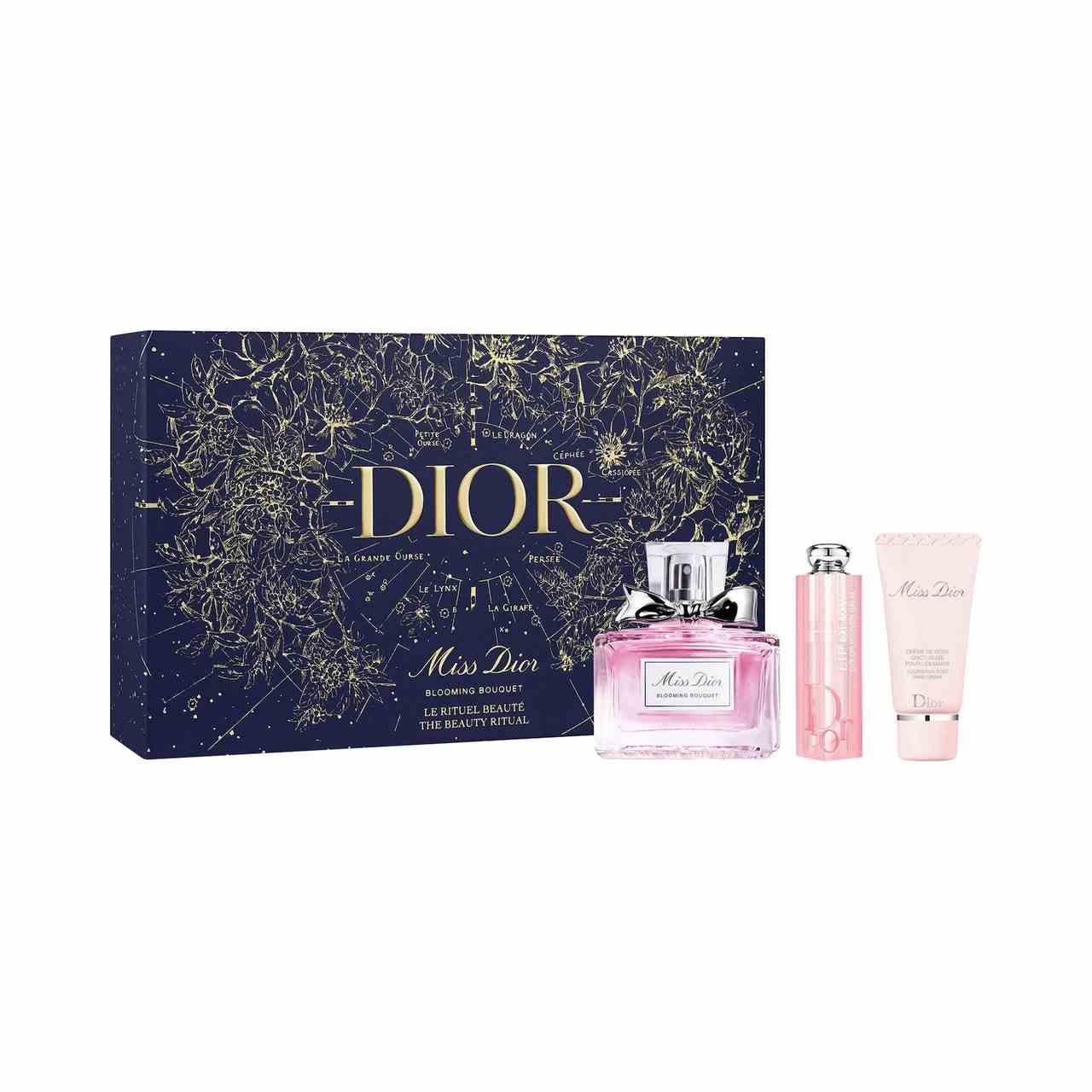 Dior Miss Dior Blooming Bouquet und Lip Glow Geschenkset rosafarbene Flasche Parfüm, Lippenbalsam und Lotion mit marineblauer und goldener Box auf weißem Hintergrund