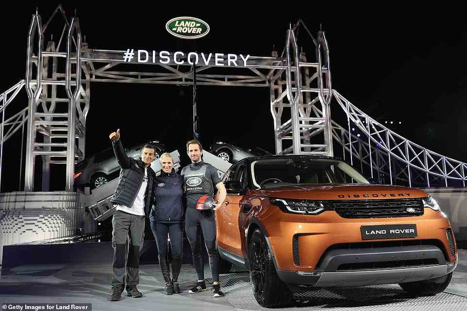 Zara with Bear Grylls, left, and Sir Ben Ainslie, right, posing during the launch of Land Rover's 'New Discovery' at Packington Hall in 2016