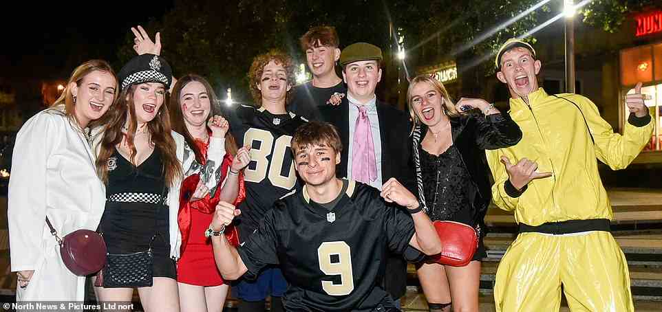 Partygoers dressed as American football stars, police and other appropriately flamboyant outfits hit the town in Newcastle
