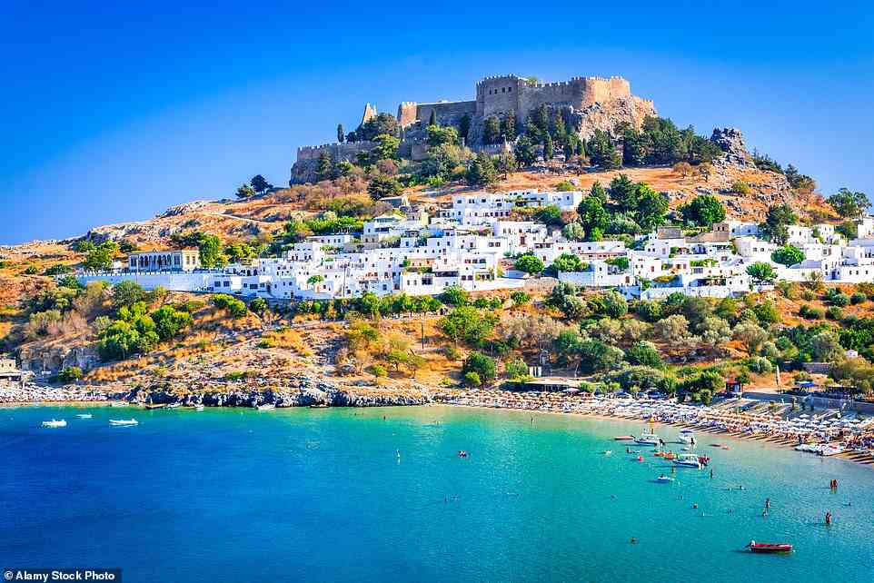 Respite: Summer is over and a long (and expensive) winter is on its way, but all is not lost if you sneak in a quick autumn escape. Tui is offering seven nights all-inclusive in a resort in Rhodes from £687 per person. Above is the island's pretty town of Lindos