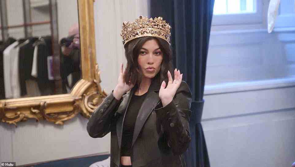 Crown: Kourtney tries on the crown, which Steph says is, 'A look. This is how you should greet everyone,' while Kourtney blows a kiss to the camera