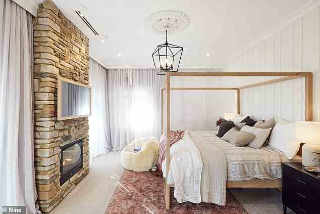 Pictured is the master bedroom, pictured, which has country charm with a Rinnai gas fireplace