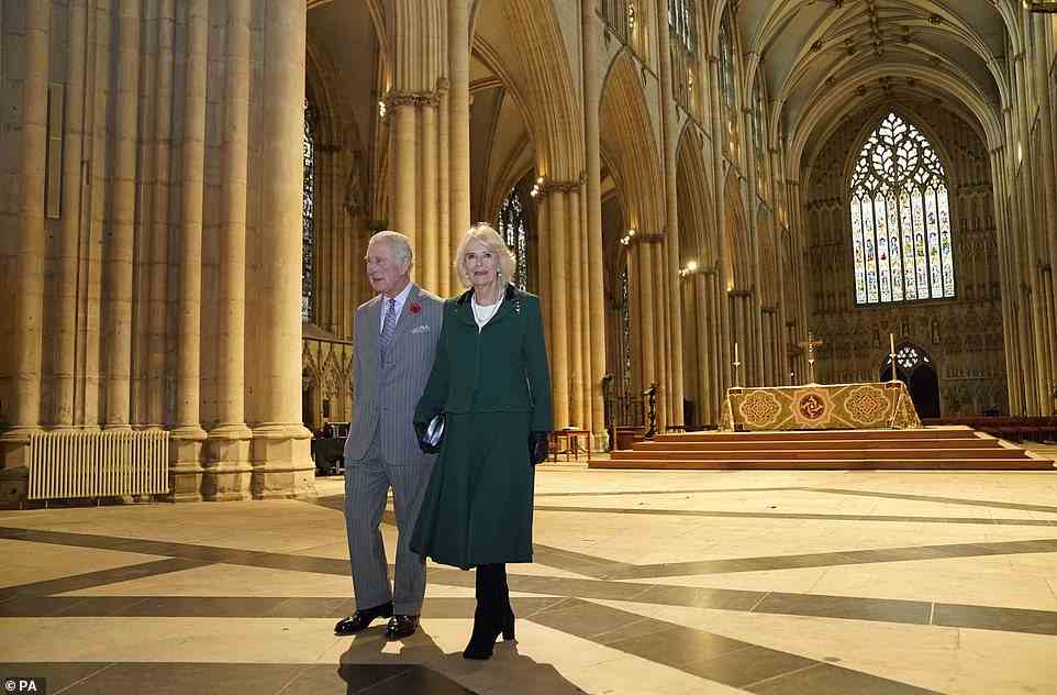 The royal couple walk down the magnificent nave of York Cathedral before this morning's service