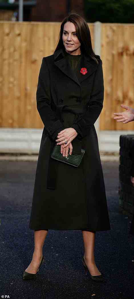 Kate paired the coat with a khaki dress and matching accessories