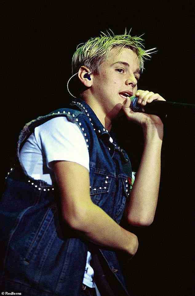 Teen idol: The singer grew up in the shadow of Nick's world-conquering boy band but released his first record in 1997 at the age of just nine, on the same label that led his brother to stardom, Jive (pictured in the 1990s)