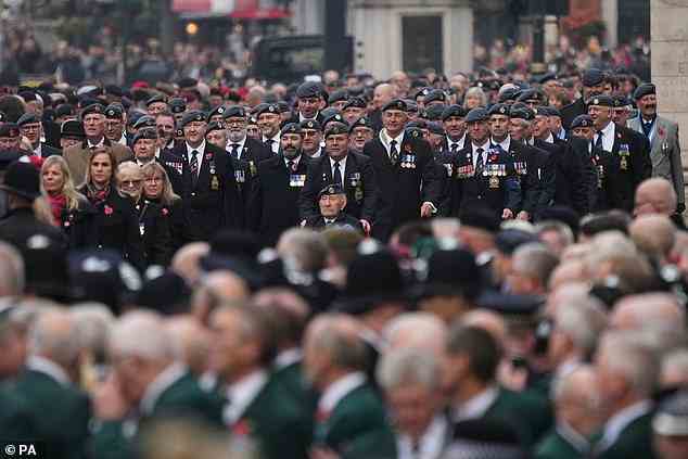 Military veterans marched past during the Remembrance Sunday service at the Cenotaph on Sunday