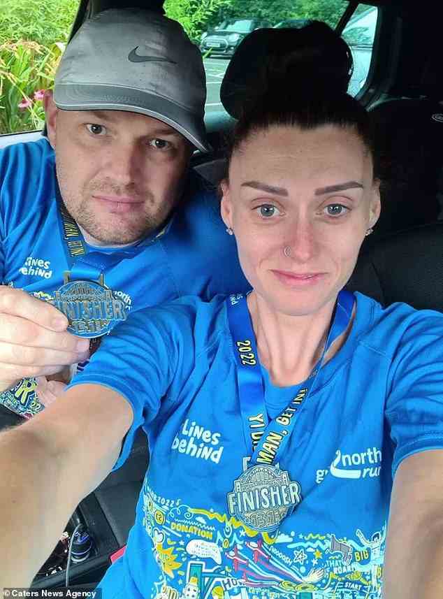Steven and Joanne beamed for a selfie with medals after finishing a charity run which they did together