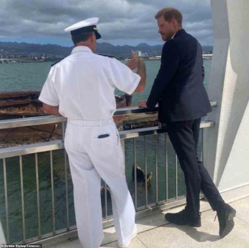 The Duke of Sussex, 38, donned a smart blue suit as he surprised onlookers in Hawaii as he paid a visit to the USS Arizona Memorial at Pearl Harbor this weekend
