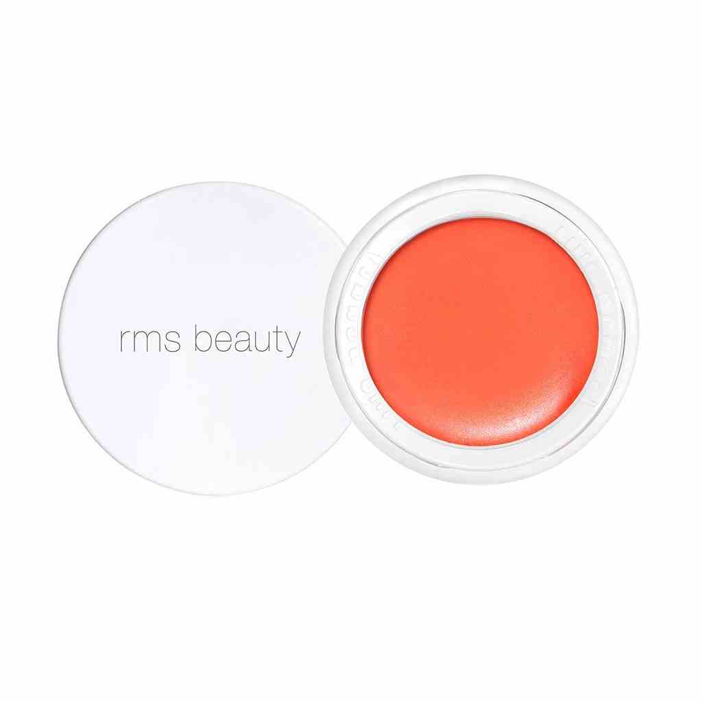 RMS Beauty Lip2Cheek Kleines Glas mit orangefarbenem Rouge mit weißem Deckel angelehnt auf weißem Hintergrund