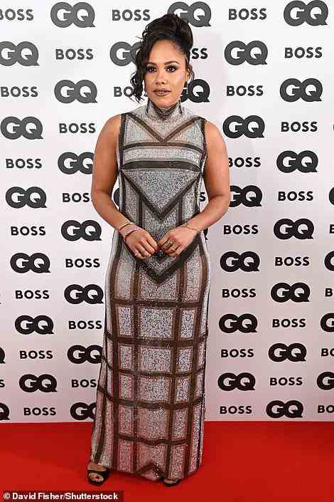 Elegant: Alex Scott looked incredible in a semi-sheer geometric print dress which showcased her svelte physique