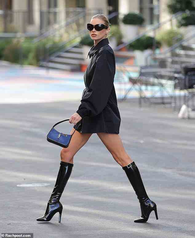 Hohe Beine, hohe Preise: Die 5 Fuß 9 Zoll große Schönheit kombinierte Helsas Jacke mit den 1.590 $ teuren „Lala 105“-Stiefeln von Saint Laurent und behielt die „mutige“ 460 $ teure Saint Laurent-Sonnenbrille und die teure „Hobo“-Handtasche ihres vorherigen Looks