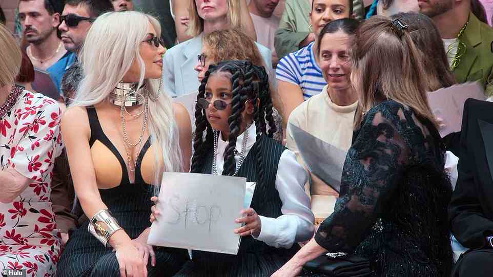 Stop: There she stole the show outside their hotel, as adoring fans started screaming her name, while getting styled by top French designers and even showing up would-be photographers with a literal 'Stop' sign in the front row of the Jean-Paul Gaultier fashion show
