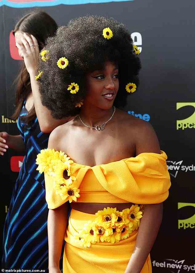 Tsehay Hawkins of the Wiggles looked gorgeous in a bright yellow dress with sunflowers in her hair