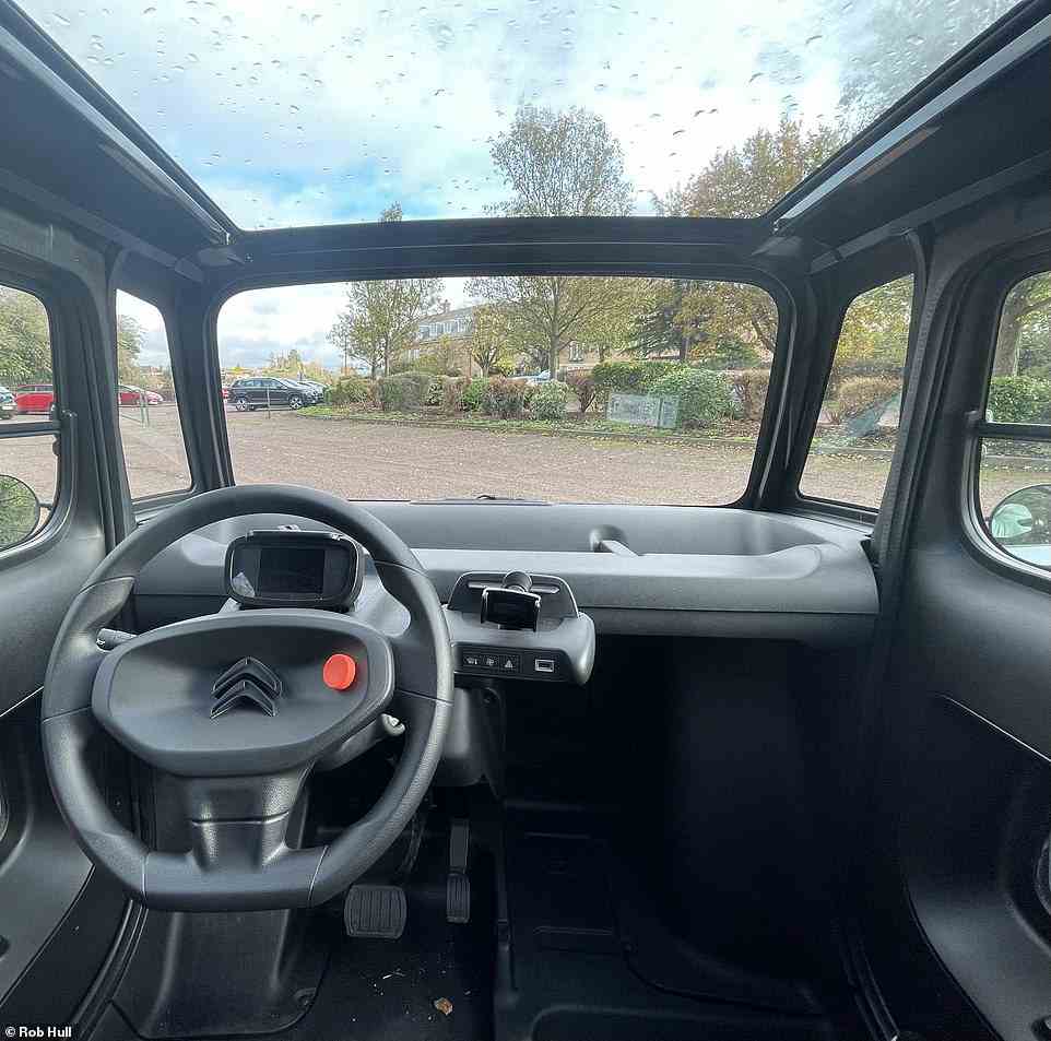 Sparse, it certainly is. Bar the main controls, there's a USB socket, heater function with one speed, screen demister and hazard warning light button. While you're packed in, the glass roof and square windows at least make it feel airy