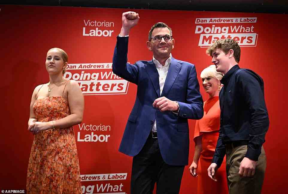 A jubilant Mr Andrews with his wife and children ahead of his victory speech after he won a third term as Victoria's Premier
