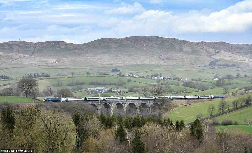An Avanti Pendolino train captured crossing the Docker Viaduct in Cumbria. Fares from London Euston to Oxenholme Lake District cost from £30.90