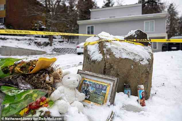 A memorial has grown at the residence of the four students who were killed on November 13