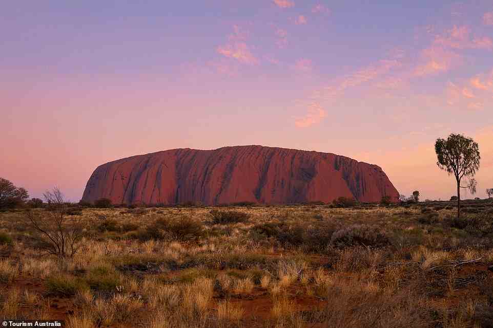 Pride of Australia: Fiona McIntosh visits Australia's most iconic landmark, Ayers Rock, or Uluru as it is now known by its Aboriginal name. 'It is one of the most extraordinary natural wonders of the world,' she observes