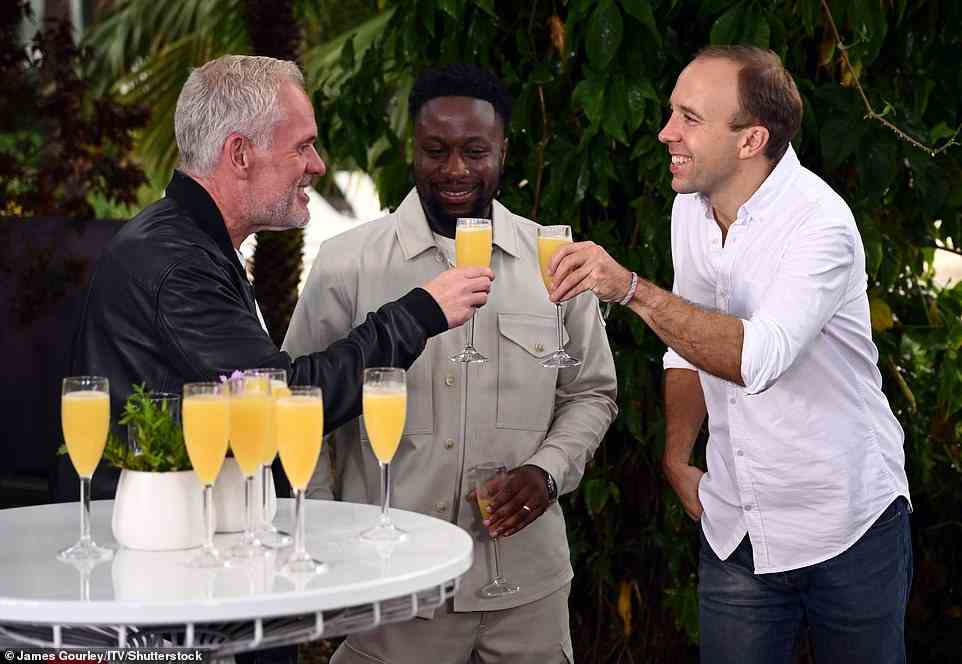 Pour it up: Chris, Babatunde and Matt raised a glass as they caught up