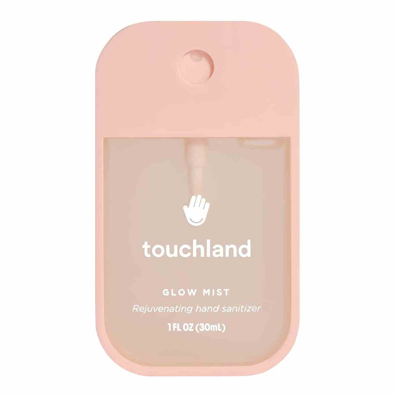 Touchland Glow Mist Rejuvenating Hand Sanitizer Hellrosa Händedesinfektionsmittel auf weißem Hintergrund