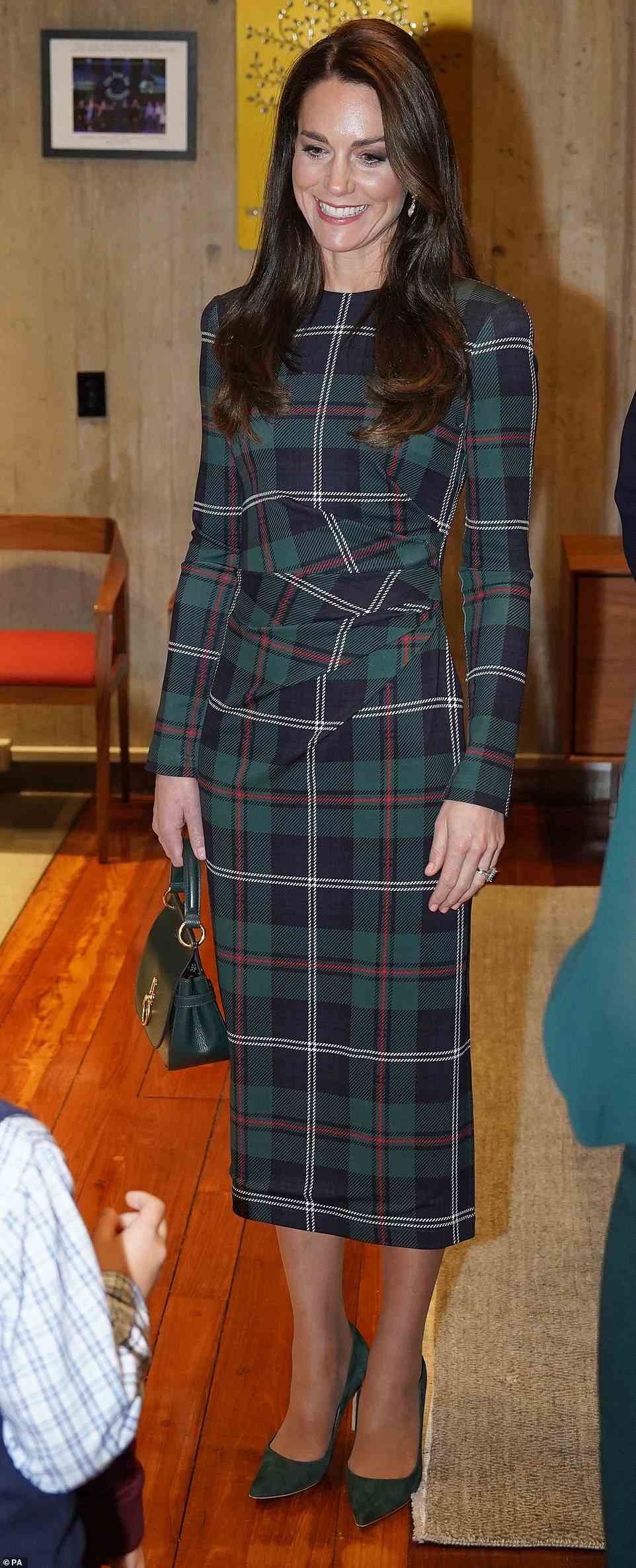 At an Earthshot launch on Wednesday, Kate made a sartorial statement about climate change in a green plaid Burberry dress, which she paired with a with matching Alexander McQueen coat and Mulberry bag