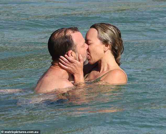 On Tuesday morning Galafassi was seen hugging and kissing the bikini-clad blonde in the water and on the sand in front of other swimmers