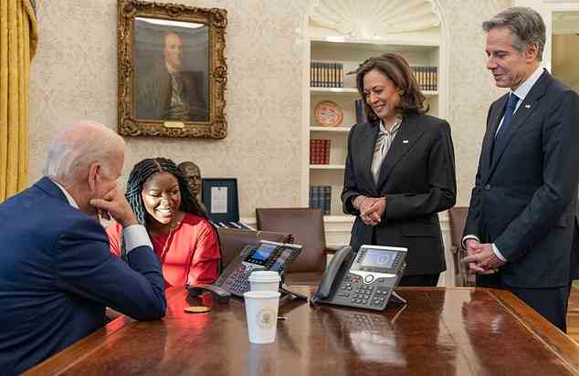 Biden spoke with Griner on the phone Thursday morning while her wife, Cherelle, was in the Oval Office PICTURED (from left to right): Biden, Griner's wife Cherelle, Vice President Kamala Harris, and Secretary of State Antony Blinken in the White House Oval Office