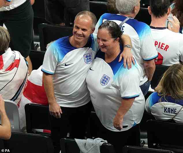 Gary Maddison and Una Maddsion, parents of James Maddison, pose for a photo in the stands ahead of the FIFA World Cup Quarter-Final match at the Al Bayt Stadium in Al Khor, Qatar