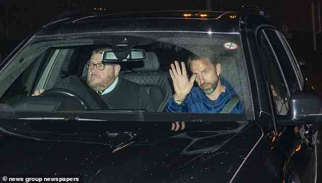 Manager Gareth Southgate waved for supporters as he was driven away from Birmingham Airport