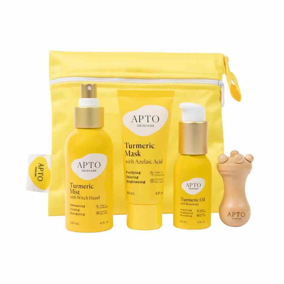Apto Skincare Turmeric Glow Bundle gelbe Hautpflegeprodukte und Kosmetiktasche auf weißem Hintergrund