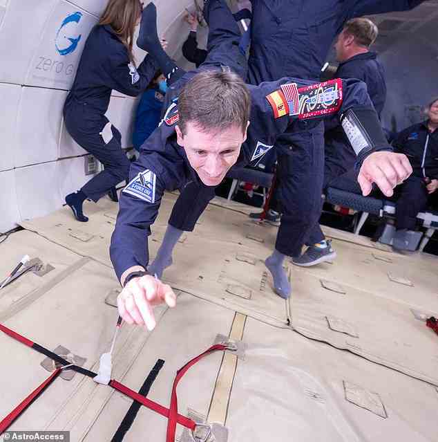 Jose Luis de Augusto, a Spanish aerospace engineer who uses a wheelchair, demonstrates zero-gravity docking space techniques for future space vehicles