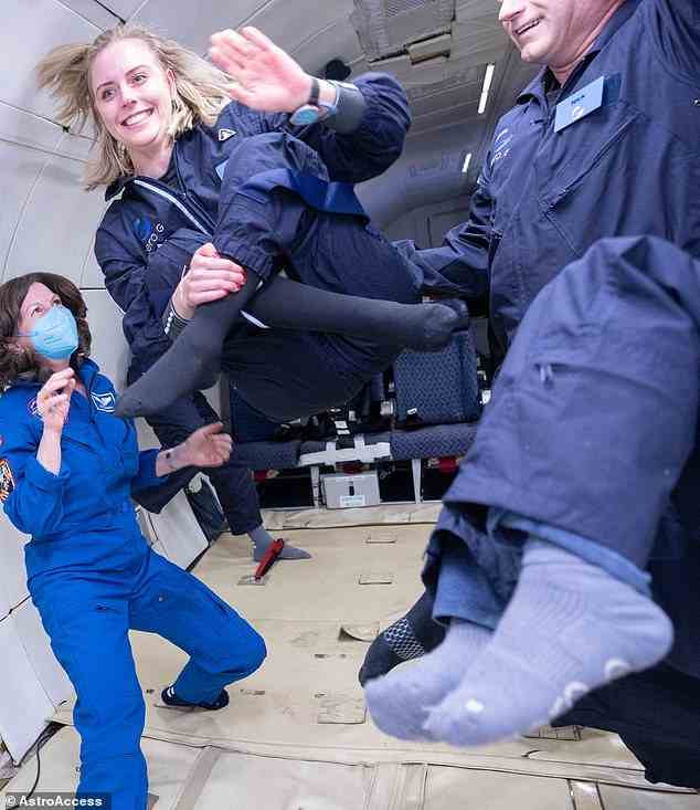Michi Benthaus (centre), a German aerospace engineering student who uses a wheelchair, onboard AstroAccess' disabled research parabolic flight conducted on December 15, 2022 at Ellington Field in Houston Texas. She is joined by former NASA astronaut Cady Coleman (left)