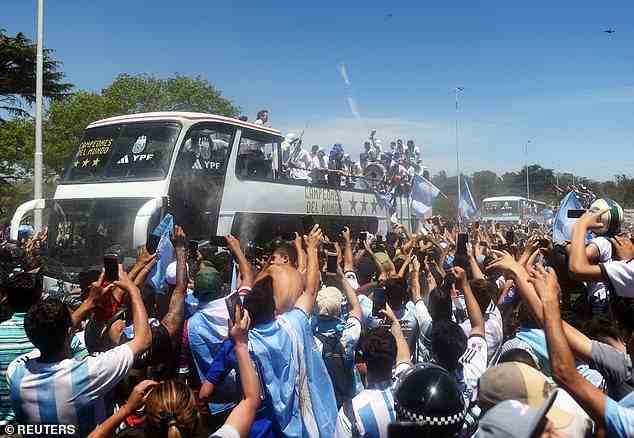 Ecstatic crowds greeted the victorious team as they travelled through Buenos Aires