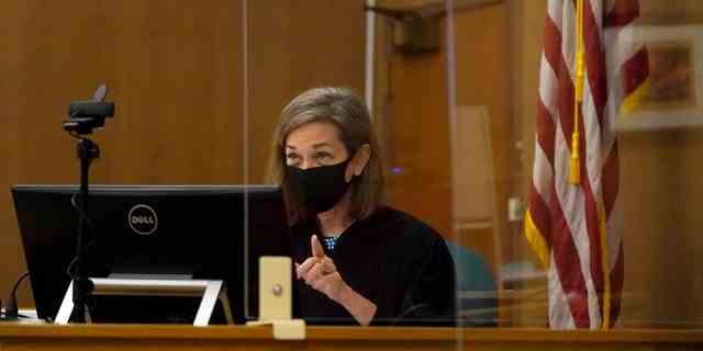 Judge Anne-Christine Massullo gestures toward attorneys during a hearing at the San Mateo County Superior Court in Redwood City, Calif., Feb. 25, 2022. 