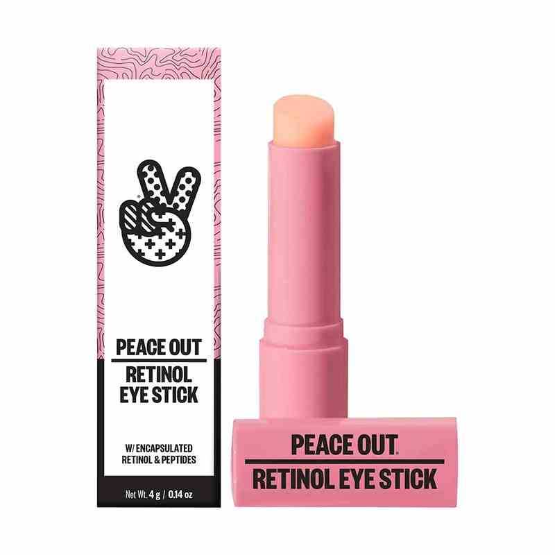 Peace Out Retinol Eye Stick: Eine rosa Tube Augenbalsam auf weißem Hintergrund