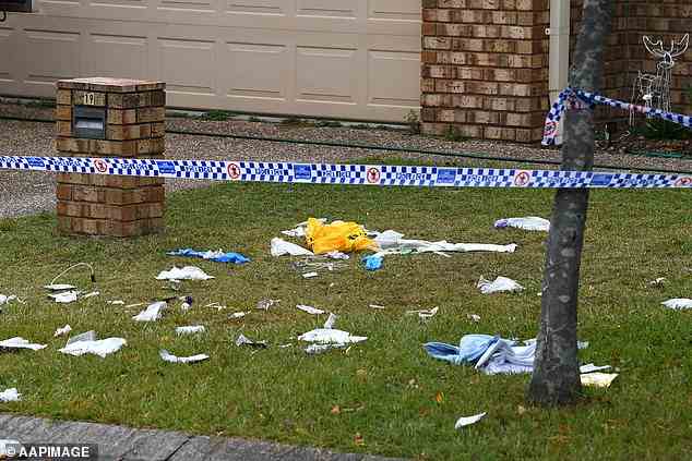 Debris from the violent altercation was seen strewn across the front yard on Tuesday morning