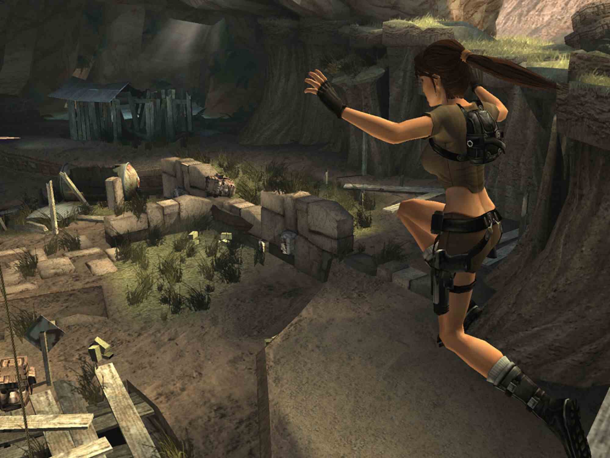 Ein Screenshot zeigt eine computergenerierte Frau mitten im Sprung in einer höhlenartigen Umgebung