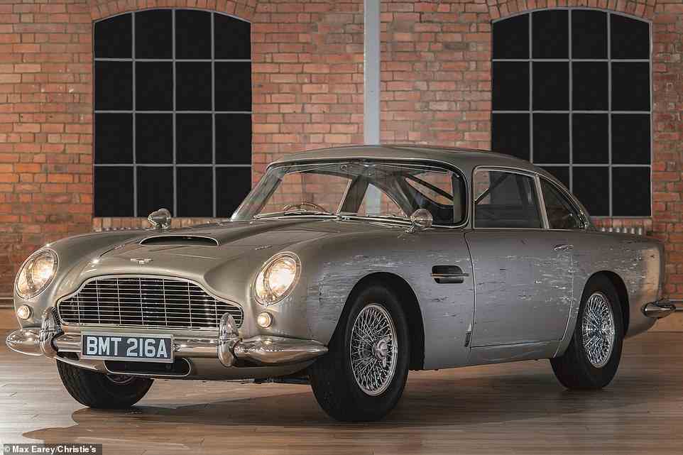 Not a DB5 as you know it: This battered-up Aston Martin isn't an original classic that's been involved in a crash; it's the purpose-built stunt car used in 2021 Bond film, No Time to Die. It sold at a 007 auction in September for a massive £2.9million