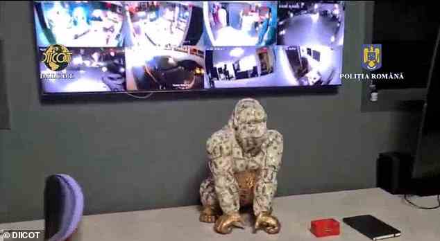Images from the raid also showed what appeared to be an elaborate home security system and a gorilla made of US currency