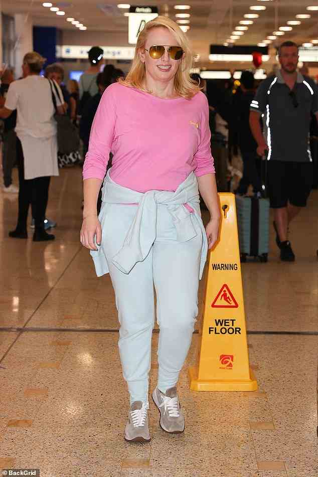 Rebel Wilson (pictured) looked fresh and relaxed as she stepped off an international flight from Los Angeles to Sydney on Saturday