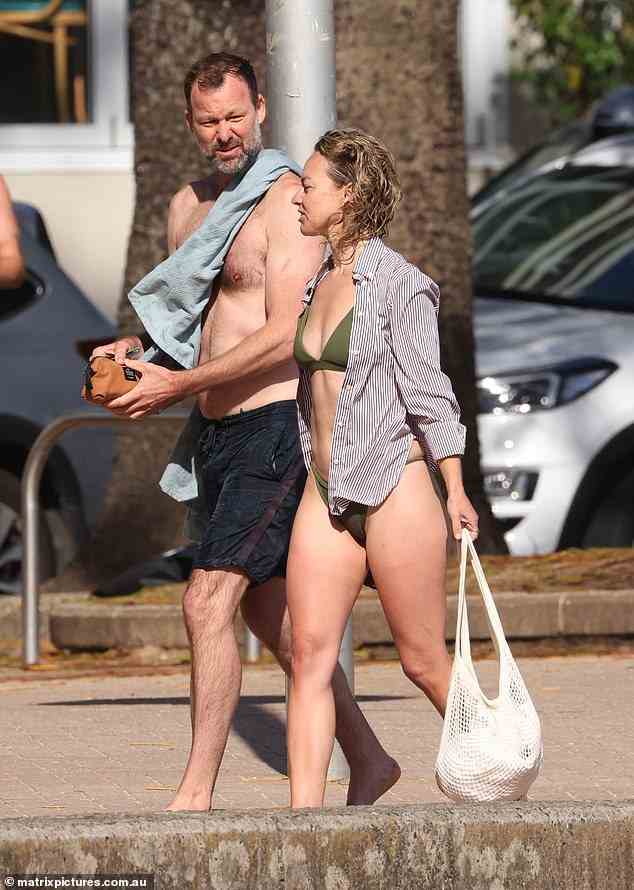 Toni Collette’s husband Dave Galafassi (left) has broken his silence after he was pictured kissing and cuddling his new chiropractor girlfriend Shannon Egan (right) at Manly Beach in the surf on Wednesday
