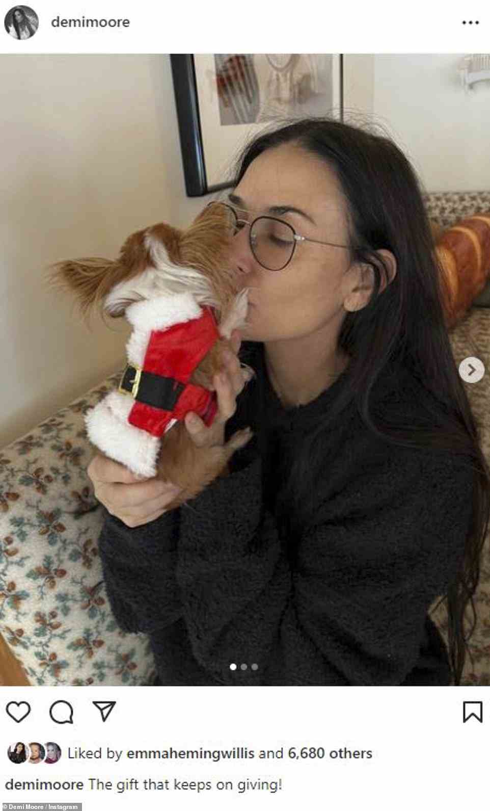 Cute! Demi Moore looked every bit the doting dog mom in her latest Instagram post as she planted a sweet kiss on her adorable teacup chihuahua, Pilaf