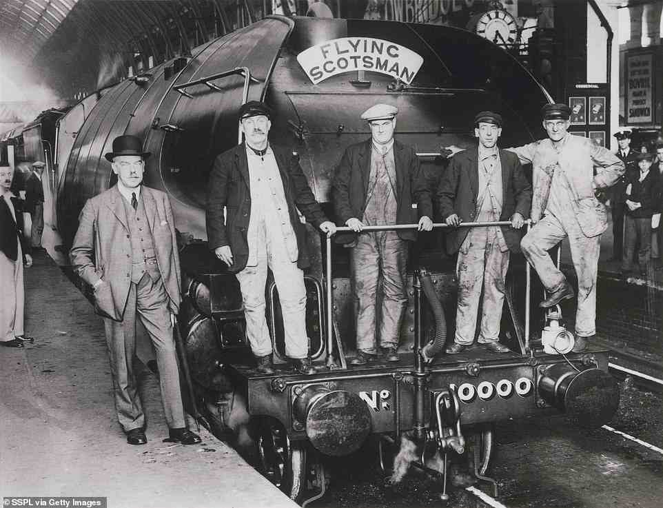 This 1930 picture shows a 'Flying Scotsman' service train at London King's Cross. Nigel Gresley (1876-1941), Chief Mechanical Engineer of LNER - who designed the Flying Scotsman locomotive, which was named after the service - is pictured on the platform, while locomotive crew and firemen stand by his side