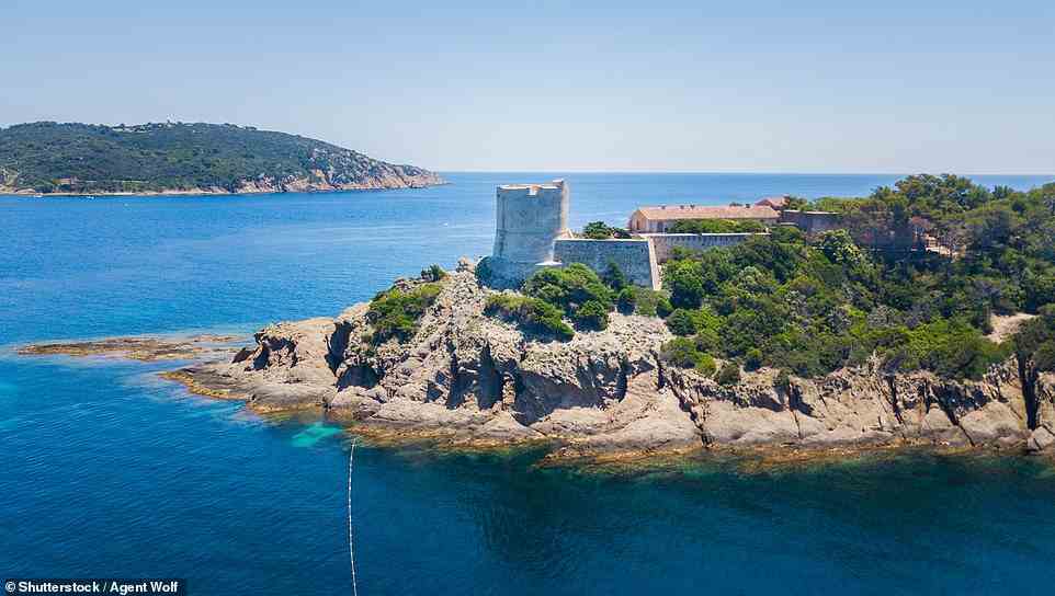 This car-free island in the south of France, not far from Saint-Tropez, is a hiker's paradise, with 21 miles of trails. 'Be Robinson Crusoe for a day and set upon the island’s marked trails, losing yourself among the arbutus and cistus trees,' the local tourist site says. If you like the idea of staying on the island, you can check into Le Manoir hotel, which was built around 1840, arriving via ferry or water taxi from Hyeres or Le Lavandou. Pictured is the isle's Fort de Port-Man, one of several forts on the island. It has been a peaceful National Park since the 1960s, but it endured 'stormy' times prior to the 20th century. 'For centuries, Port-Cros was regularly ransacked by pirates mooring on its coasts,' the website reveals. In the 1500s, it was used as a home for convicts, which 'only worsened the level of crime and looting'. In August 1944 during World War II a German garrison of 150 men battled - and were ultimately defeated by - American and Canadian troops