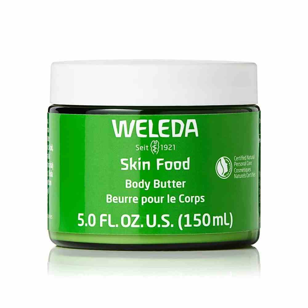 Weleda Skin Food Body Butter grünes Glas mit weißem Deckel auf weißem Hintergrund