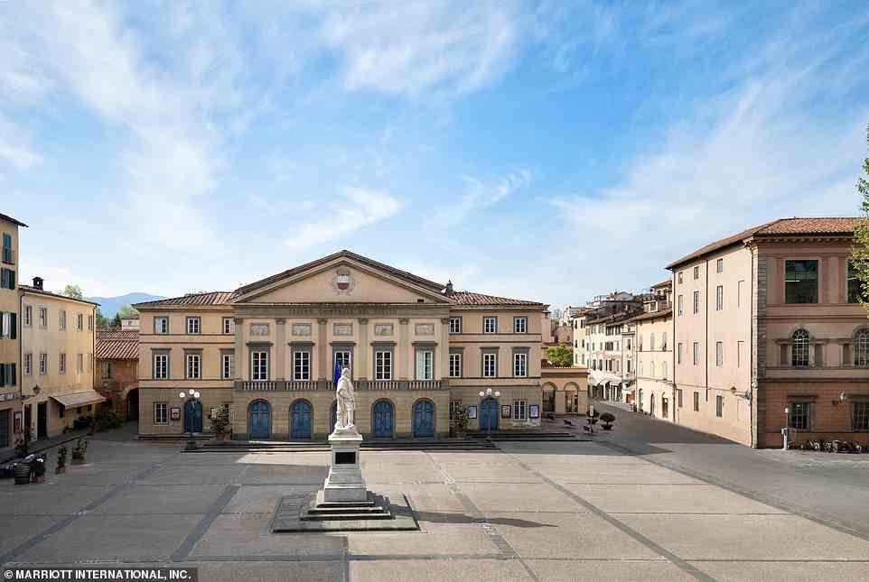 Lucca's Grand Universe hotel (above) is housed in a former palazzo with soaring ceilings