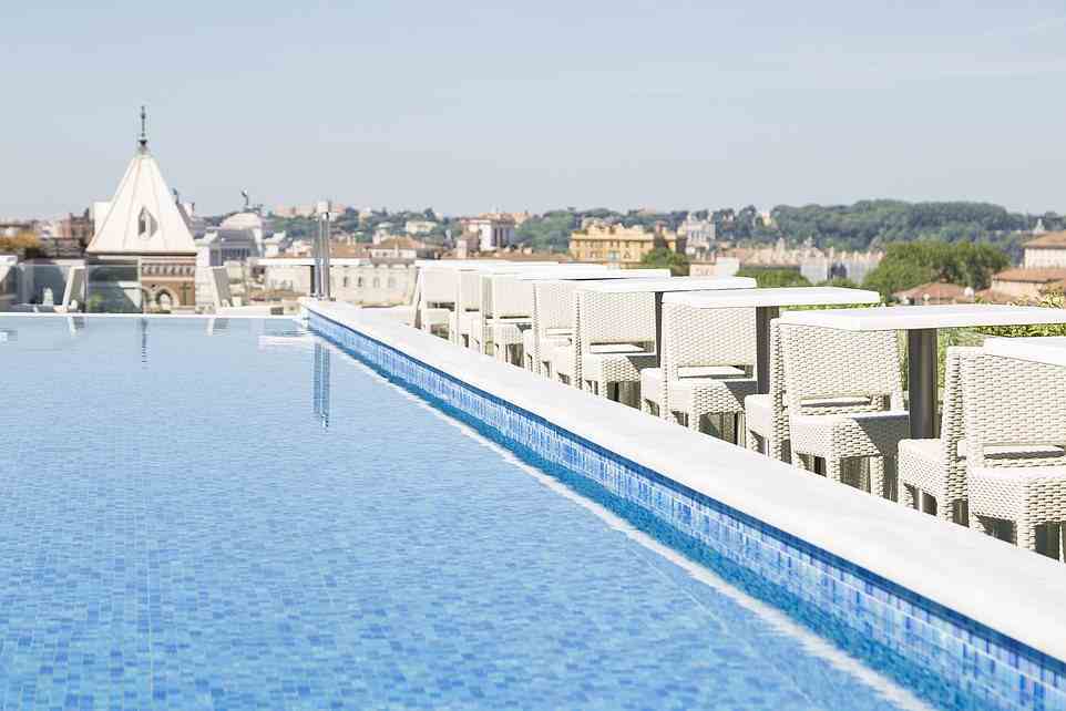 The Anantara Palazzo Naiadi Rome Hotel offers the rare luxury of a rooftop swimming pool - though Fiona notes that 'half of Rome seems to be in it'