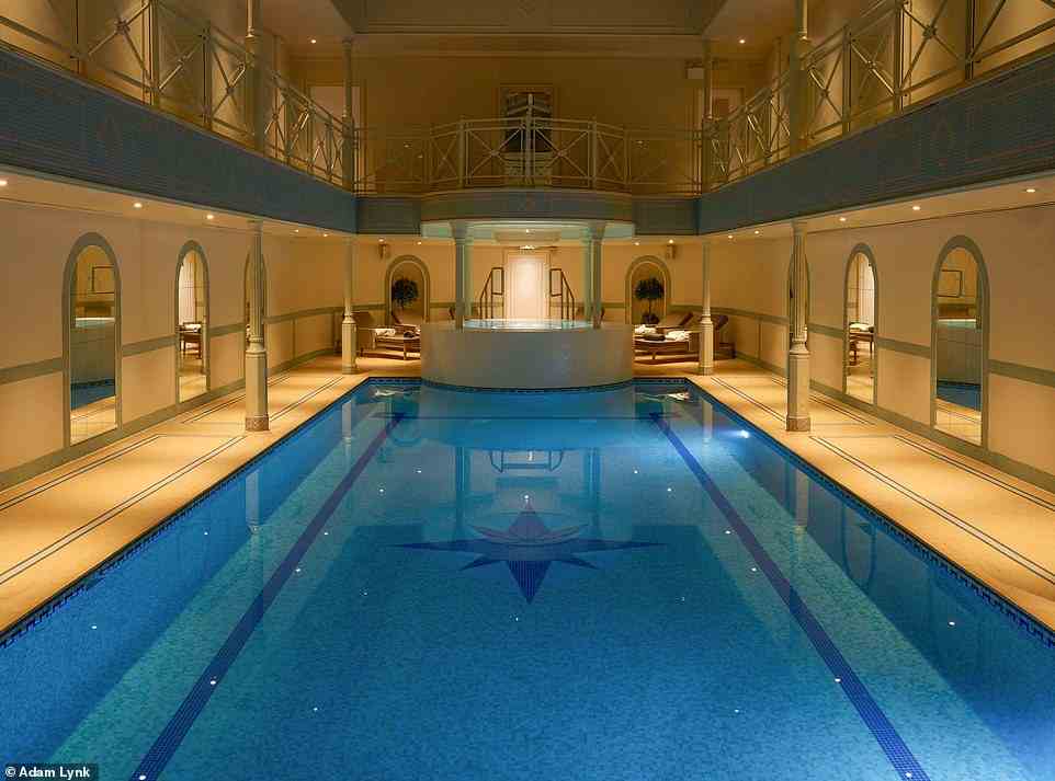 Rooms at The Lygon Arms Hotel are priced from £259 per night. Pictured is the hotel's eye-catching pool