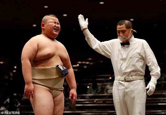 Save for Sumo wrestlers, people in Japan will be fined if their waistline is too big in a national attempt to slim down citizens (file image)