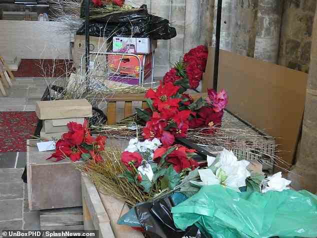 Flowers: Props were pictured scattered around the church